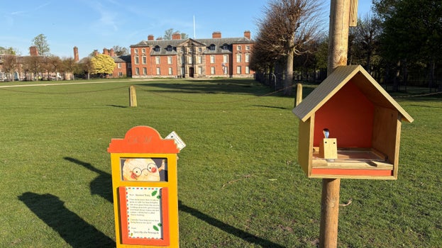 An image of a family trail spot with the Dunham Massey house in the background.